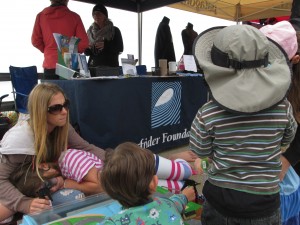 Amber works the Watershed Table to educate the younger generation.